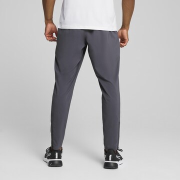 PUMA Tapered Sportbroek 'TAD Essentials' in Grijs