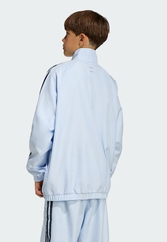 ADIDAS ORIGINALS Between-season jacket 'Teamgeist' in Blue