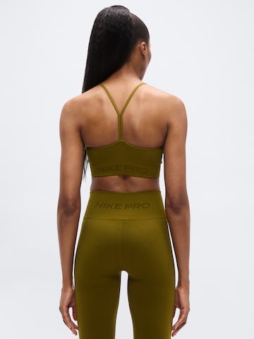 NIKE - Soutien Bustier Soutien de desporto em verde