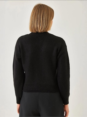 Cardigan Bianco Lucci en noir