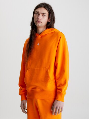 Calvin Klein Jeans Sweatshirt in Oranje: voorkant