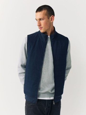 Next - Chaleco en azul