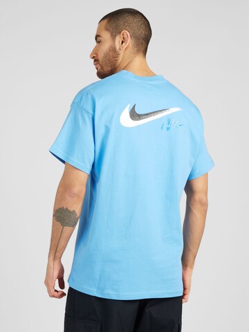 mėlyna Nike Sportswear Marškinėliai: priekis