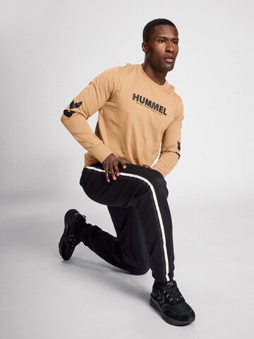 Effilé Pantalon 'LGC MARK' Hummel en noir