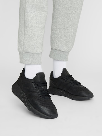 Sneaker bassa 'Zx 1K Boost' di ADIDAS ORIGINALS in nero: frontale