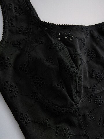 The Set Top in Schwarz