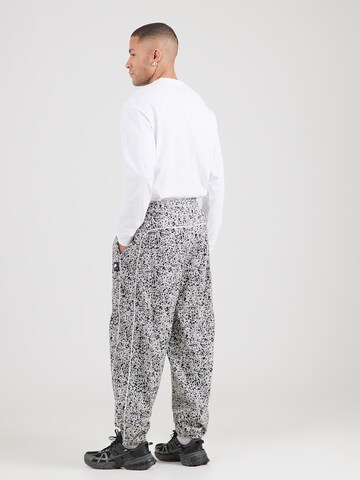 Nike Sportswear Zúžený Kalhoty 'AIR' – béžová