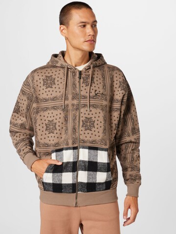 Karl Kani Zip-Up Hoodie in Brown: front