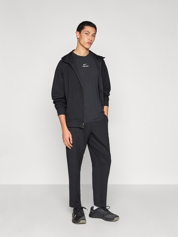 Giacca di felpa sportiva di NIKE in nero