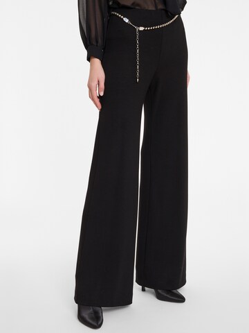 Ana Alcazar Flared Trousers 'Agisi ' in Black: front