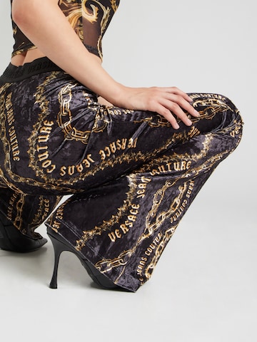 Versace Jeans Couture Zvonový Kalhoty – černá