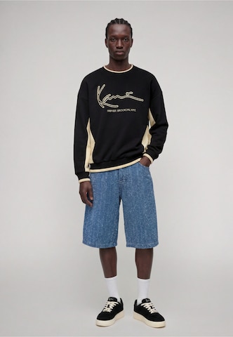 Karl Kani Bluzka sportowa 'Signature' w kolorze czarny