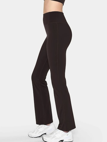 Girlfriend Collective Flared Sportbroek ' Float ' in Bruin