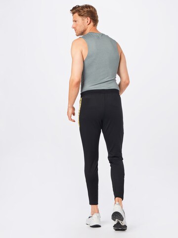 NIKE Slimfit Sportbroek 'Strike' in Zwart