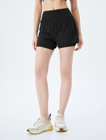 Koton Slim fit Workout Pants in Black: front