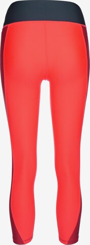 Regular Pantalon de sport UNDER ARMOUR en orange