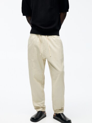 Pull&Bear Lużny krój Spodnie w kolorze beżowy: przód