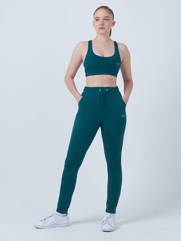 Loosefit Pantalon de sport 'Jogging Pants' SPORTKIND en vert : devant