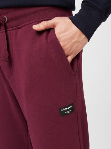 BJÖRN BORG Tapered Sportbroek 'CENTRE' in Lila