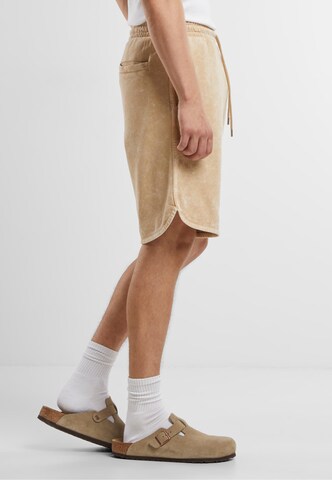 regular Pantaloni di Urban Classics in beige