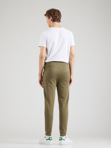 HUGO - Tapered Calças 'Doak212' em verde