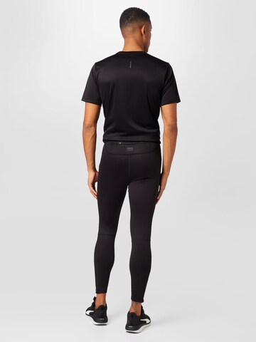 PUMA Skinny Športne hlače | črna barva
