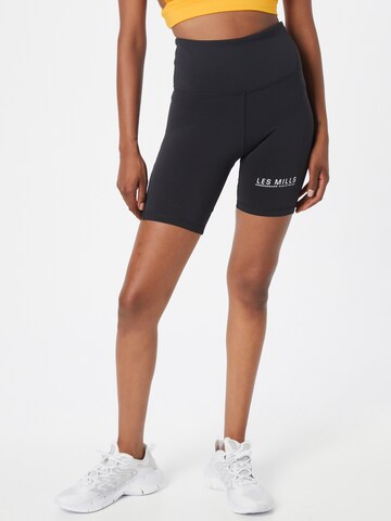 Reebok Skinny Sportbroek 'Les Mills' in Zwart: voorkant