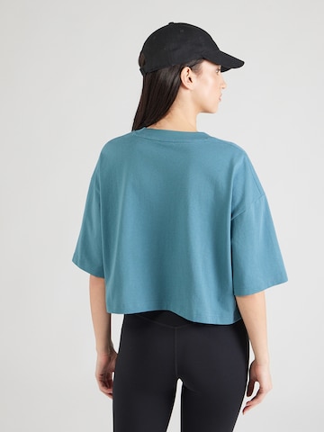 Tricou de la new balance pe albastru