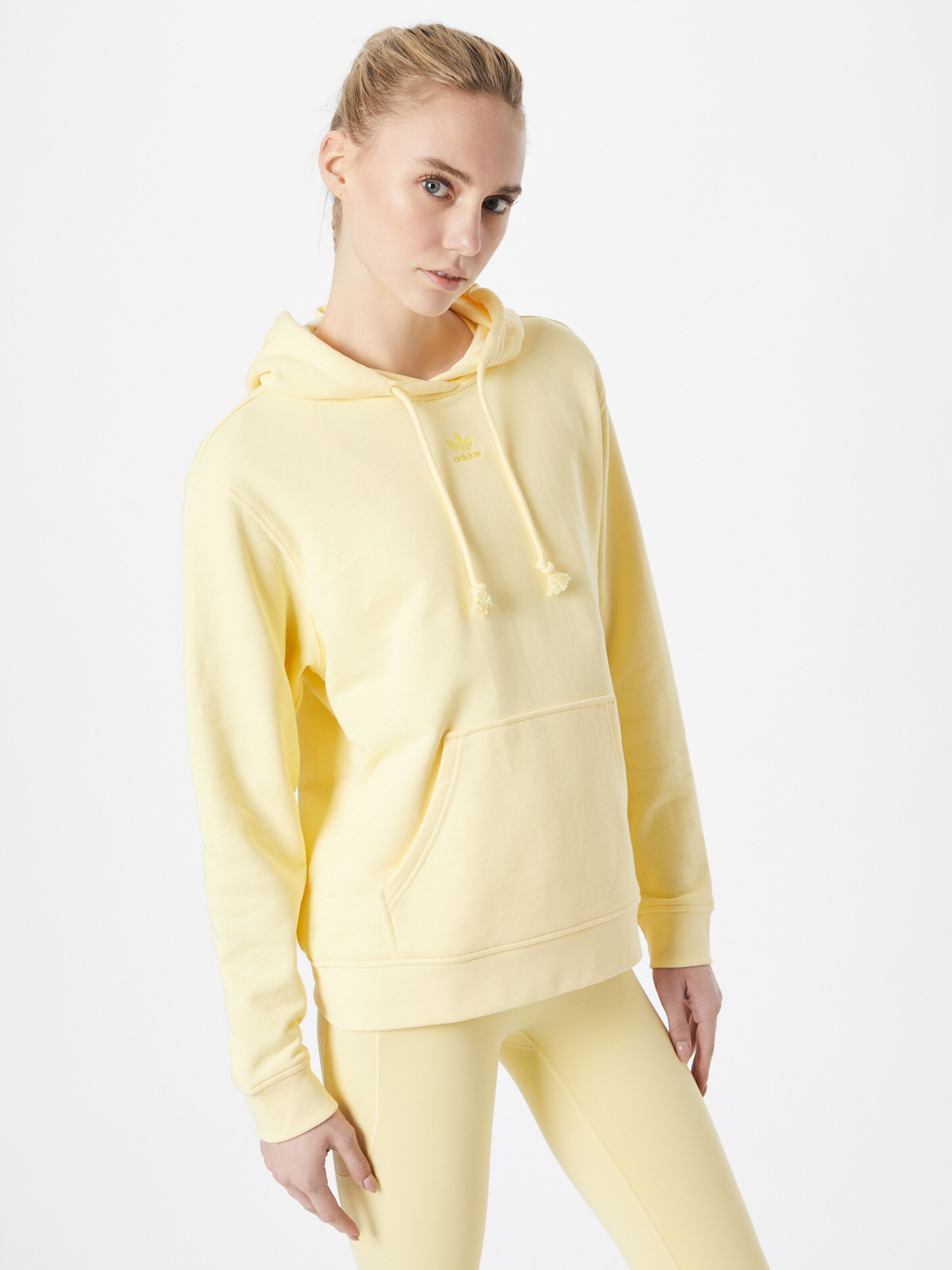 ADIDAS ORIGINALS Sweatshirt Adicolor Essentials in Pastel Yellow ABOUT YOU