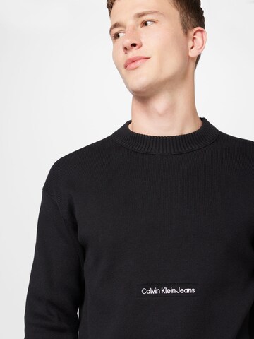 Calvin Klein Jeans كنزة صوفية بلون أسود