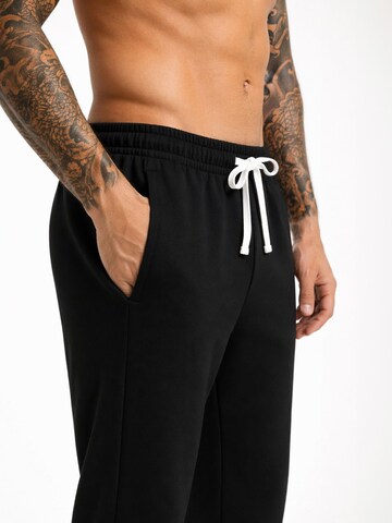 SWORTS Regular Workout Pants 'SUITE' in Black