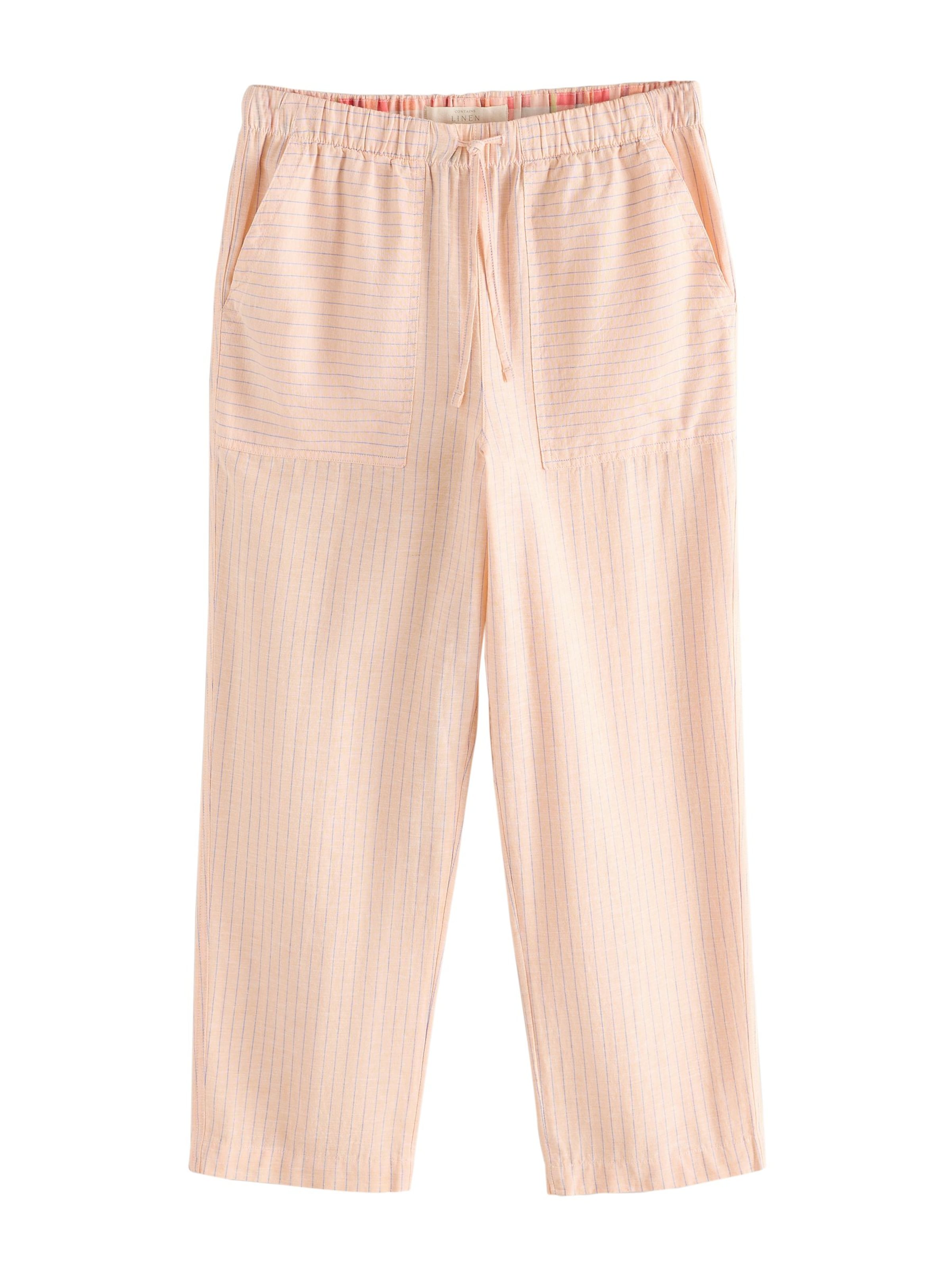 Pantaloni di Next in arancione: frontale