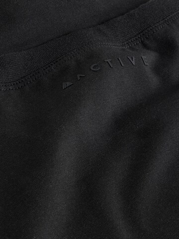 Tricou de la Next pe negru