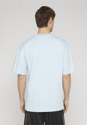 Karl Kani Tričko 'Heritage 89' – modrá