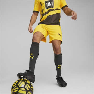 PUMA Regular Workout Pants 'Borussia Dortmund' in Yellow: front