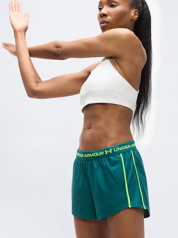 UNDER ARMOUR Normalny krój Spodnie sportowe 'Play Up' w kolorze zielony