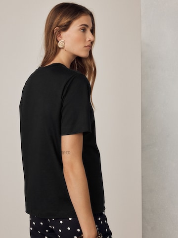 T-shirt Next en noir