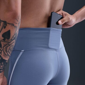 NIKE Skinny Workout Pants in Purple