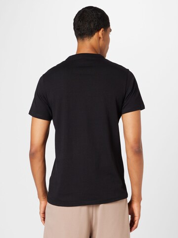 GUESS T-Shirt in Schwarz