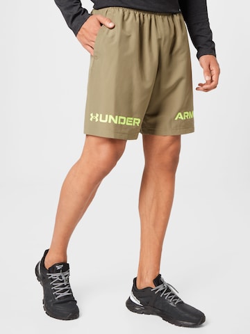 UNDER ARMOUR Regular Workout Pants in Green: front