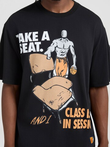 AND1 T-shirt 'Der Unterricht hat begonnent' i svart