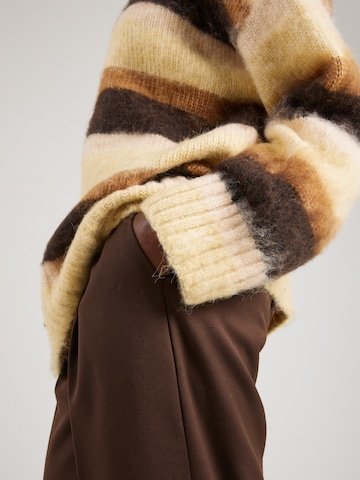 Pull-over Monki en beige