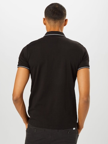 ARMANI EXCHANGE Poloshirt in Schwarz