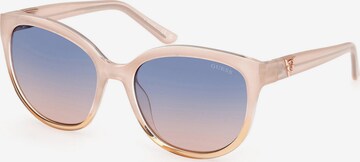 Lunettes de soleil GUESS en beige : devant