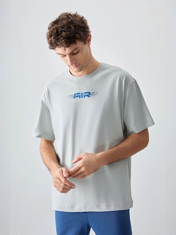 Tommy Life - Camisa 'T-Shirts' em cinzento: frente