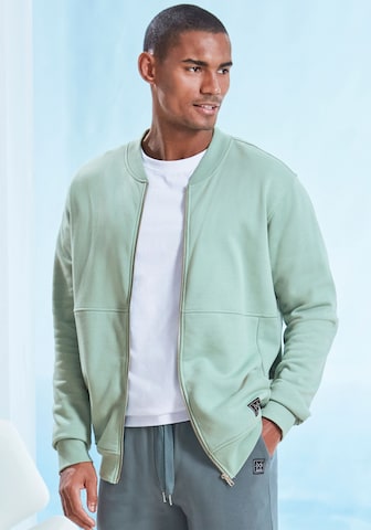 JOHN DEVIN Zip-Up Hoodie in Green: front