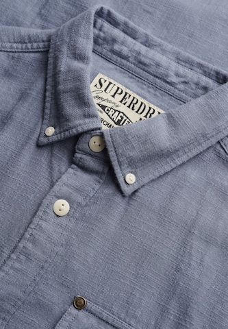Coupe regular Chemise 'The Merchant Store' Superdry & Co en bleu