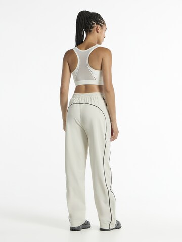 A-Game - Loosefit Pantalón deportivo 'Woven Joggers' en beige