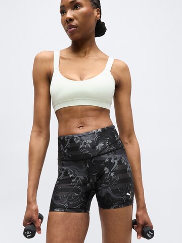 PUMA Skinny Urheiluhousut 'League' värissä musta