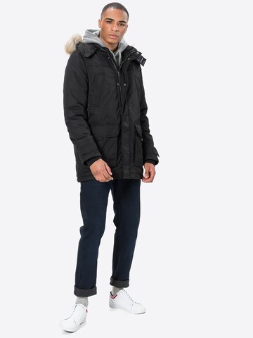 Tommy Jeans Regular fit Zimska jakna | črna barva